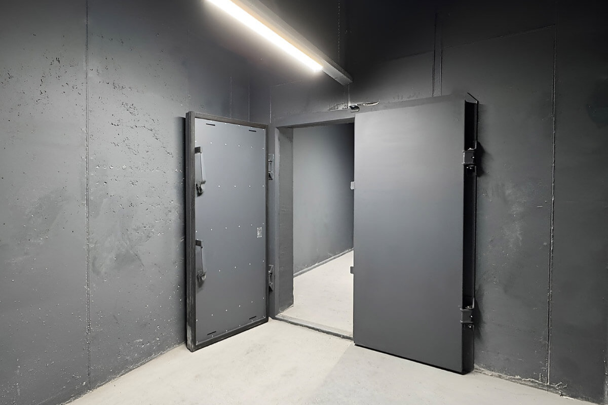 Porte para-souffle double vantaux pour entrée bunker NRBC